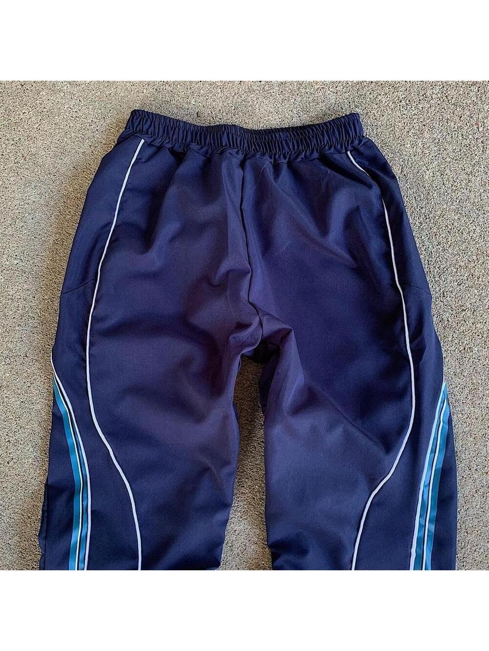 lightweight striped blue and white windbreaker pants. Wide leg opening. Size - Picture 3 of 8